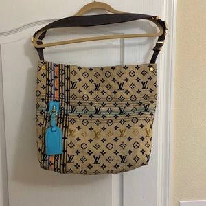 Louis Vuitton Limited Edition Blue Monogram
Cheche Bohemian Bag